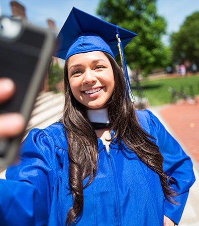 individual in graduation regalia