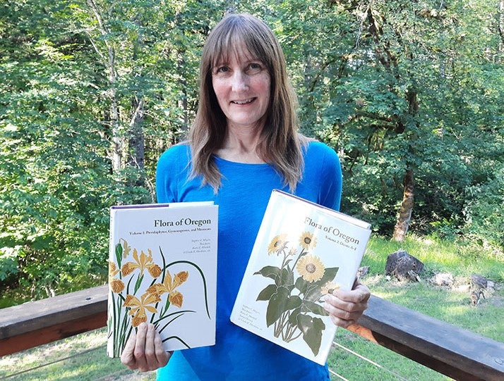 Linda with book sm_0.jpg