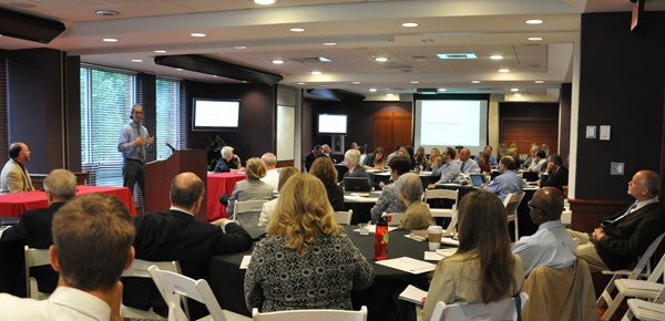 Associate Professor Nico Larco leads a panel discussion before a full house at the University of Maryland in September. Larco and A&AA Dean Frances Bronet, along with City of Springfield Assistant City Manager Jeff Towery, (seated at table far left), were invited to present SCYP concepts to administrators and other officials hoping to start a similar concept in Maryland. Associate Professor Nico Larco leads a panel discussion at the University of Maryland