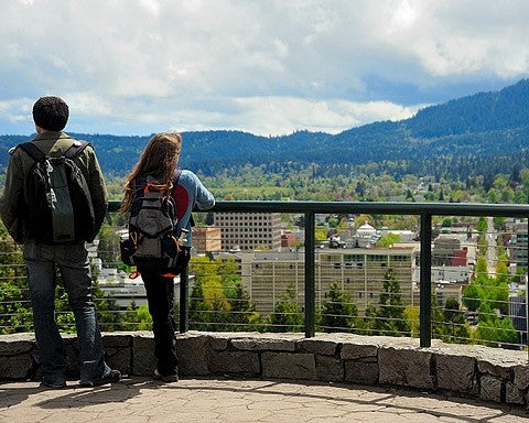 two people view Eugene from Skinner Butte