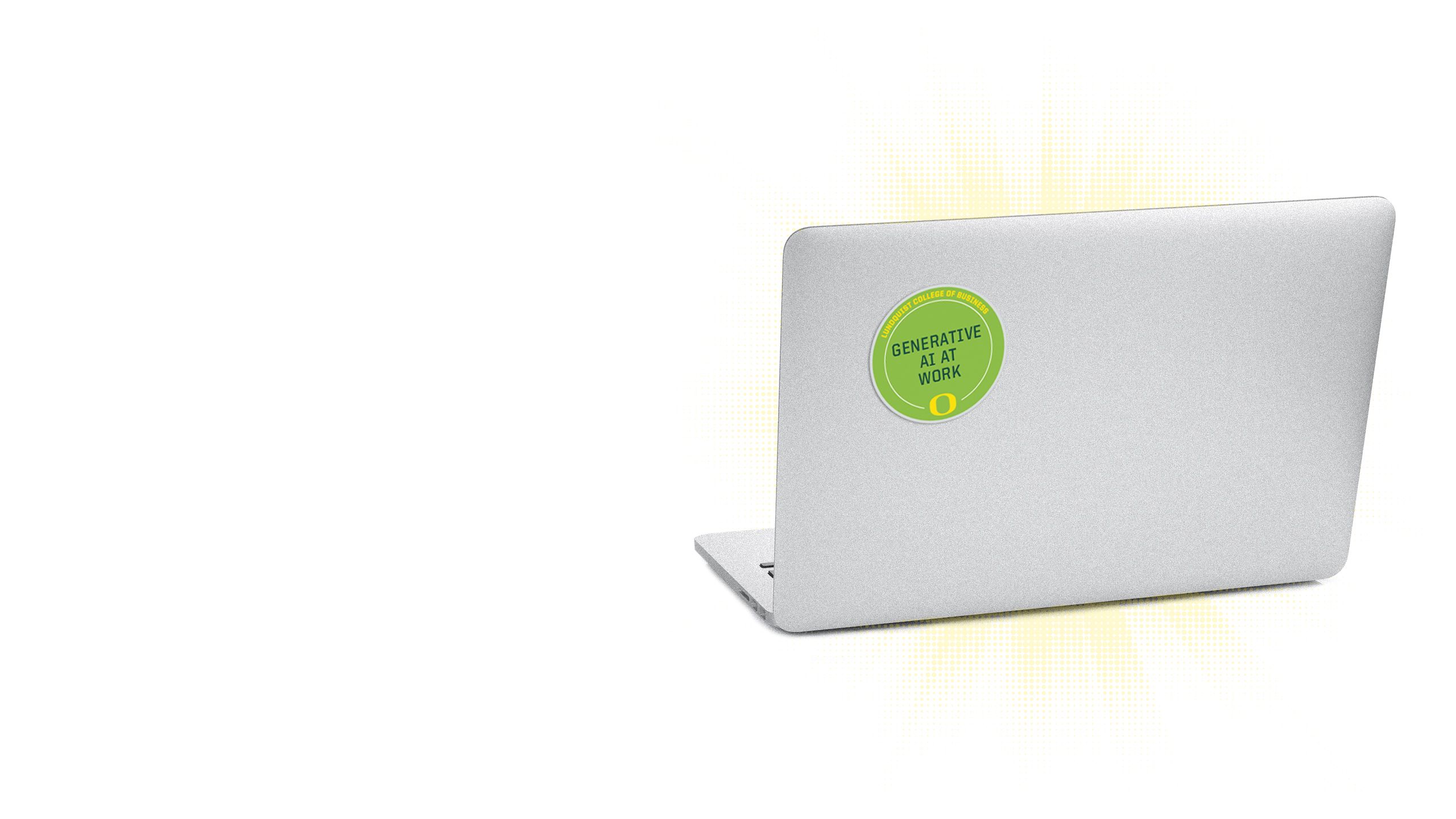 An image of the lid of a computer with multiple microcredential badges on it