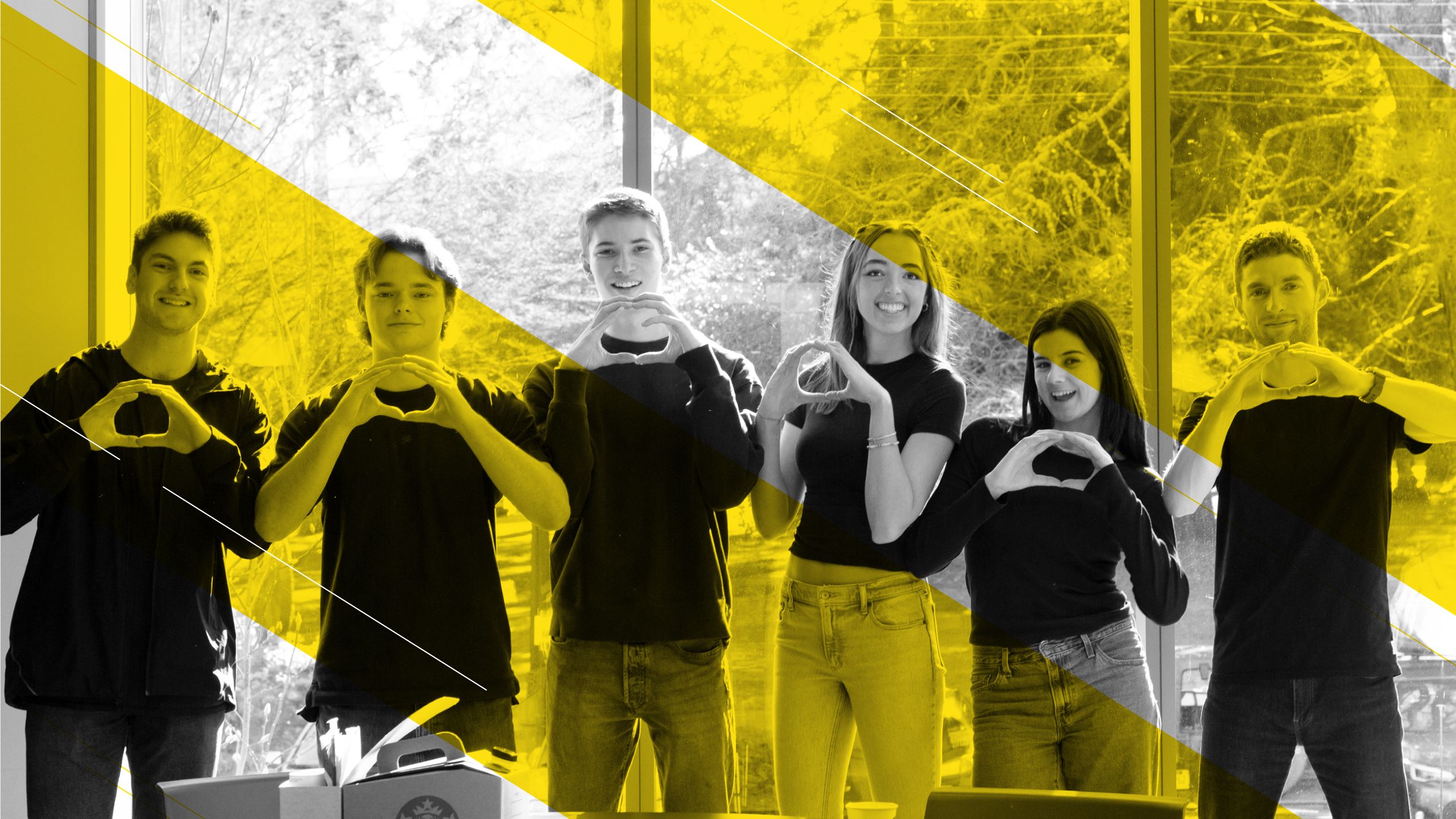 Five students and Jeff Sorensen standing, looking at the camera, with their hands in the shape of an O.