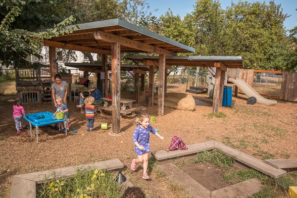 Playspace includes water table, slides, and undercover seating.