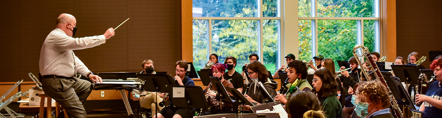 jason Silveira conducting the wind symphony