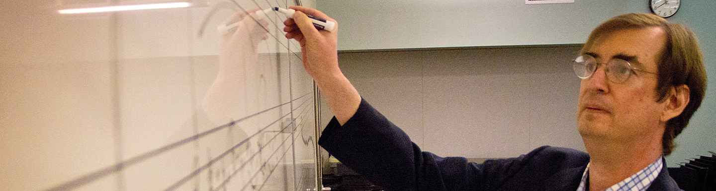 jack boss writing on a white board