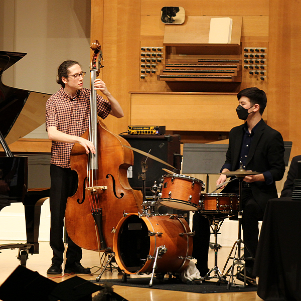 bass and guitar performing