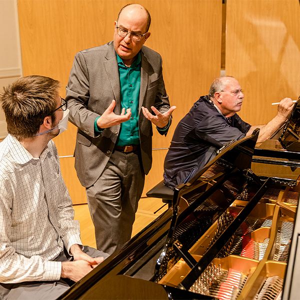 piano professor with students
