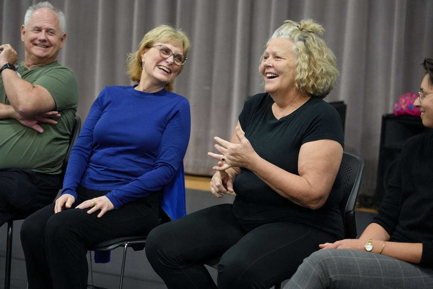 Delaney shares a laugh with Instructor Rita Honka during orientation