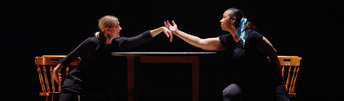 Faculty reaching out to each other in a performance
