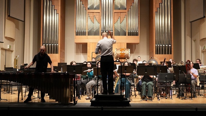 OWE rehearses for the November 26 concert in Beall Hall