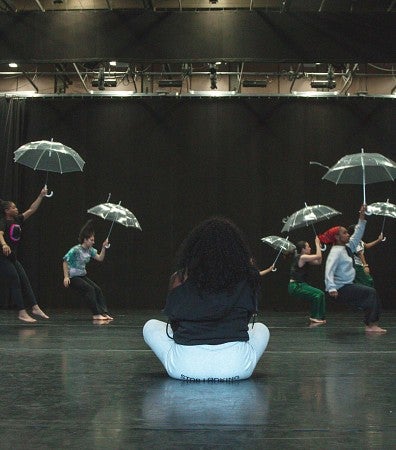 Hannah Thomas watching choreography