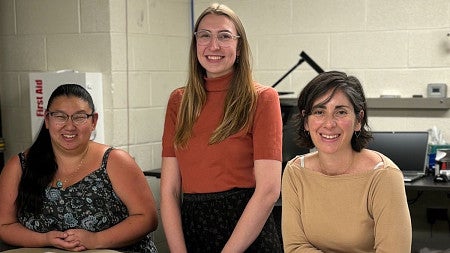 three people in a photo
