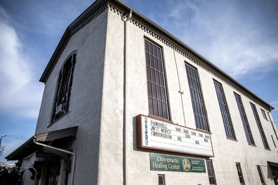 Exterior of Bijou with film listings