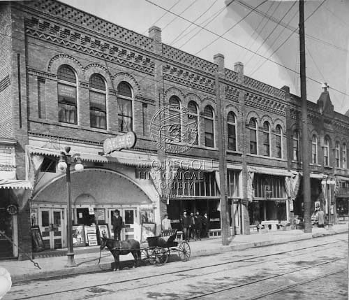 A horse and buggy outside of Acme Theater