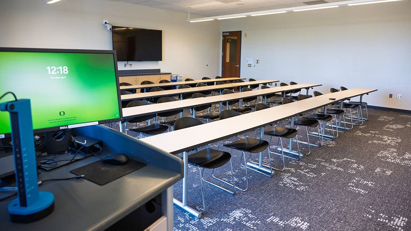 Room 301 from the podium, looking towards the rows of seating and counter. 