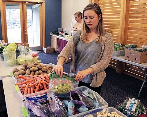 student prepares fruits and vegetables
