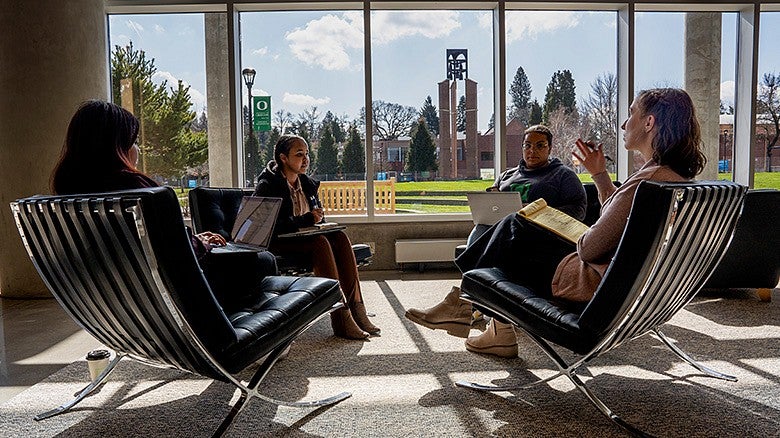 UO Portland students sitting in discussion