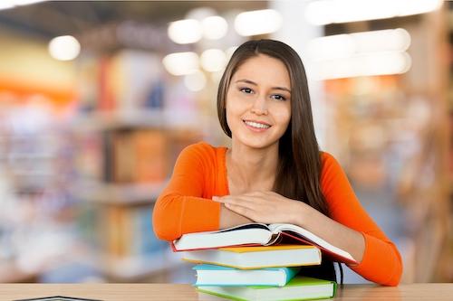Teenager with books