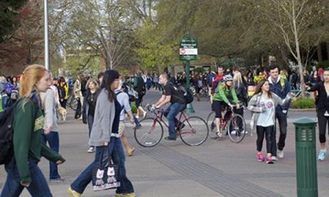 students walking and biking