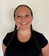 Alexis Hale has two long braids.
