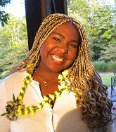 Chase Merrill has dark skin and blonde braids