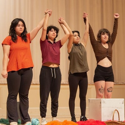 "Pocahontas and the Blue Spots" performers taking a bow