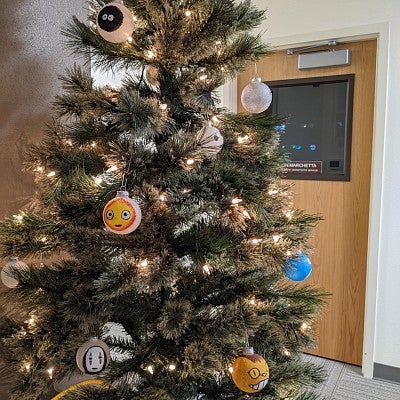 Christmas tree indoors with hand-painted Studio Ghibli ornaments