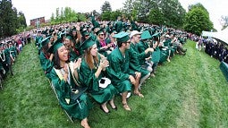  Students cheering at commencement 