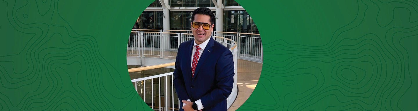 Circular photo of John Maldonado on a green background containing topographic map lines