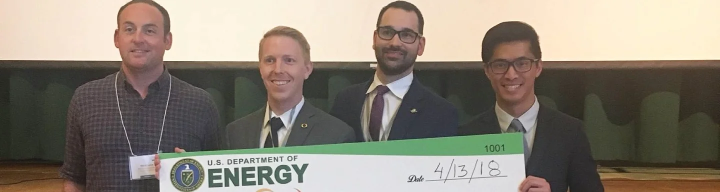 Oregon MBA team Feros Freight accepts their prize at UC Berkeley