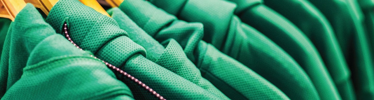 Close up photograph of racks of clothing at the Duck Store