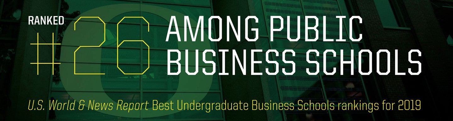 The words "ranked 26 among public business schools" against green overlay of Lillis building