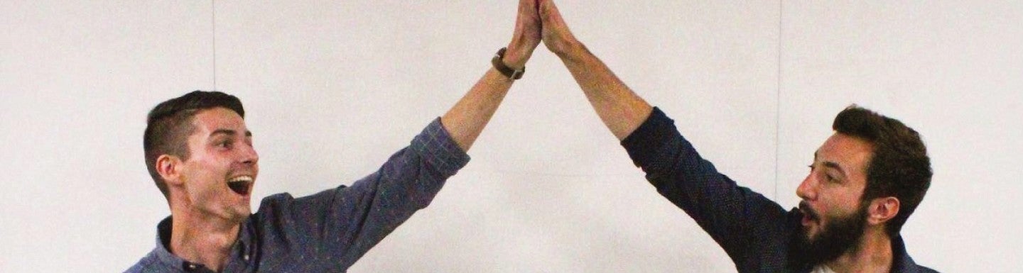 Agrifiber founders high five over their reward check