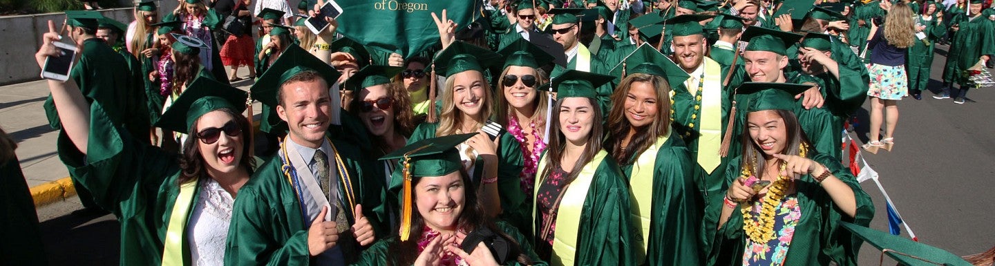 Graduates gather outside Matthew Knight Arena