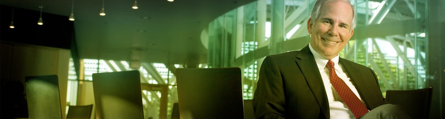 Photo of Dennis Howard in a Lillis meeting room