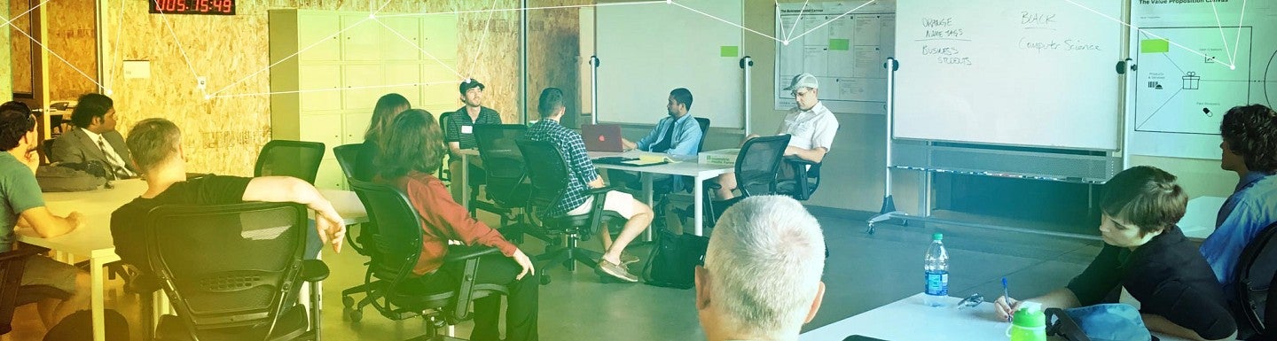 UO interns listen to a speaker