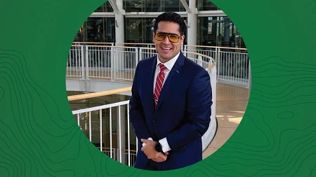 Circular photo of John Maldonado on a green background containing topographic map lines