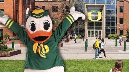 A faux-3D design of the Duck mascot in front of the Lillis Business Complex