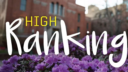 The phrase High Rankings with upward arrow iconography against a blurred background of the exterior of the Lillis building