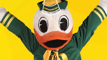 Photo of the Duck against a yellow background with white lineart icons of balloons