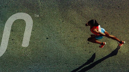 Run Gum logo with photo of a track athelete