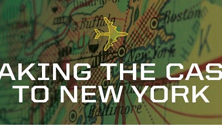"Taking the Case to New York" in the foreground of a map