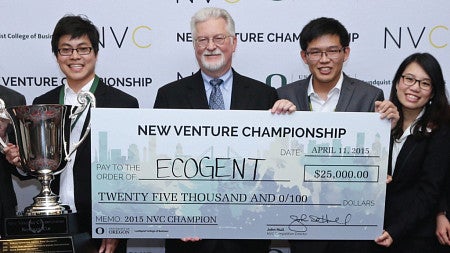 NVC 2015 Grand Prize Winning Team Ecogent in front of NVC Banner with trophy
