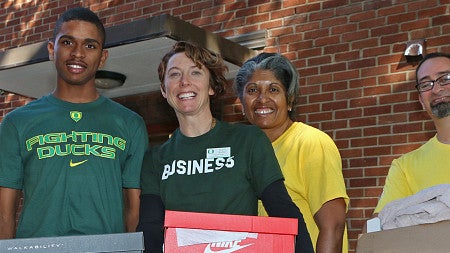 Students move into the dorms caring boxes