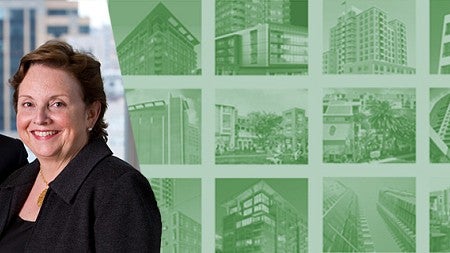 Mark and Ann Edlen next to a collage of buildings