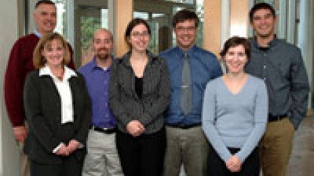 Group of students from the competition pose outside the classroom