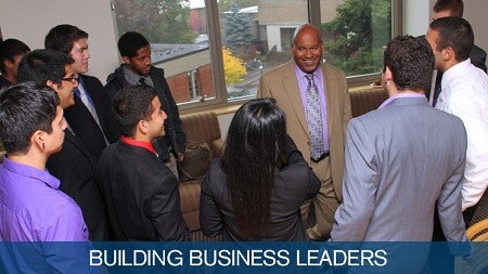Lawrence Jackson speaks with a group of business students at the University of Oregon