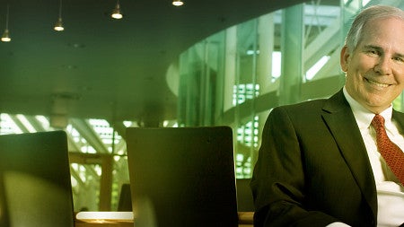 Photo of Dennis Howard in a Lillis meeting room