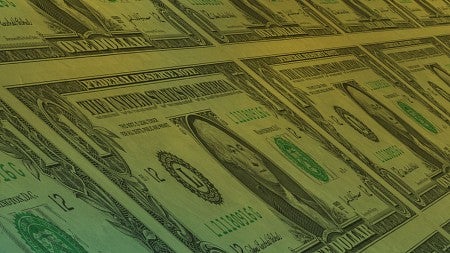 Image of dollar bills being printed