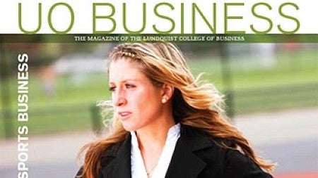 Cover image of issue with women in a business suite standing on a running track looking over into the distance with hands on here hips and the words "The Changing Face of Sports Business"